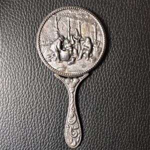 Antique petite hand mirror